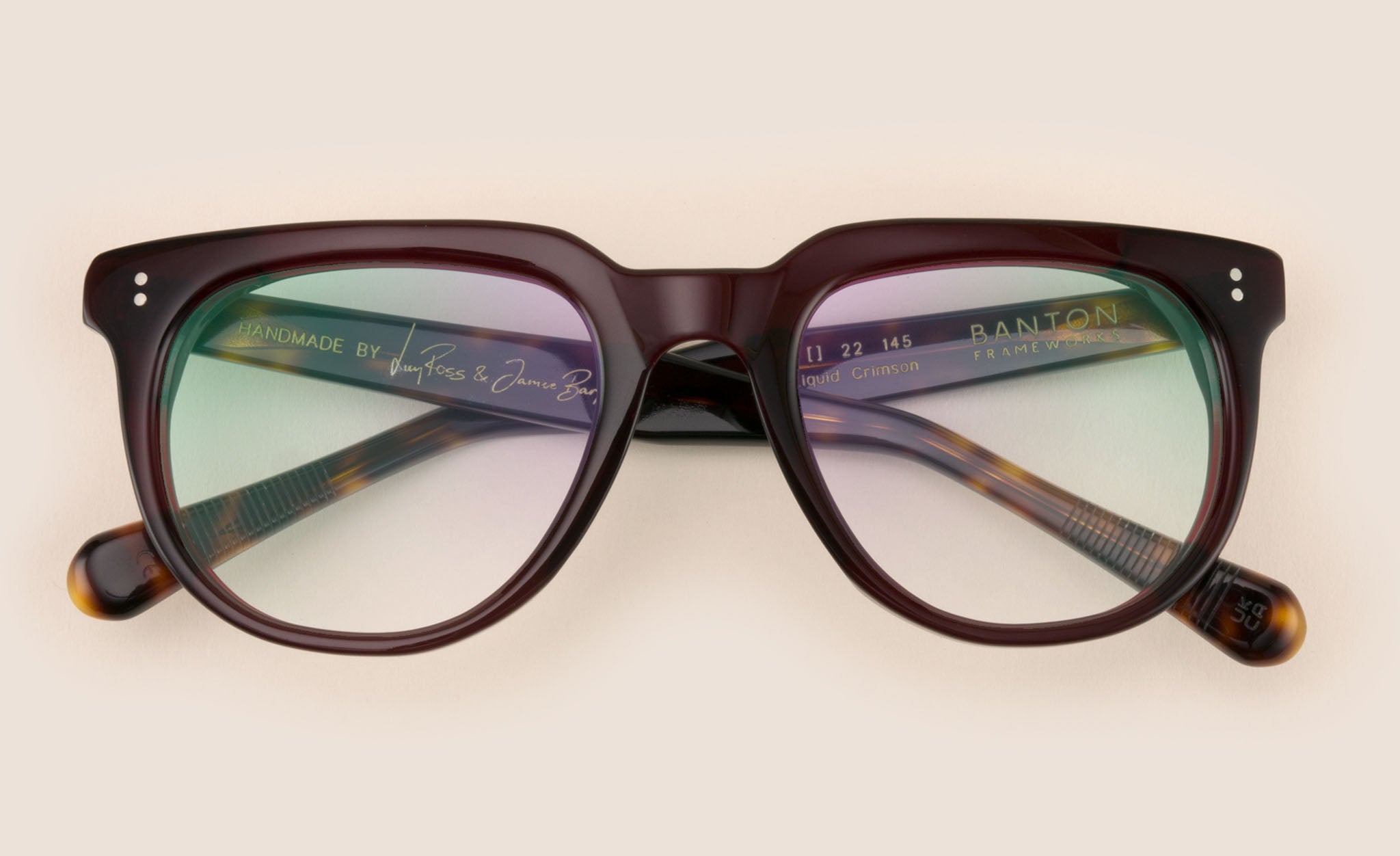 Big burgundy coloured eyeglasses frame